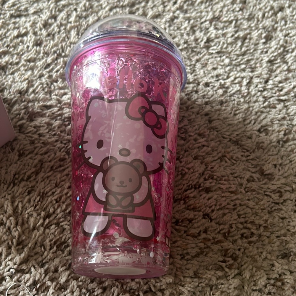 New Hello Kitty tumbler. Lights up. Confetti 3D globe lid with straw.